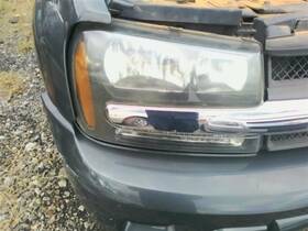 25970908 Chevrolet Truck Passenger Headlight Flush Half Width Grille Bar Fits 06-09 Chevy Trailblazer Oem