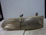 Left Driver Headlight Fits 92-95 Taurus C-46332. Fixed Price $28.78.