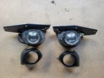 94-99 Oem Koito Mitsubishi 3000GT Stealth Fog Lights With Brackets And Covers. Fixed Price $150.00.