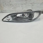 Fog Light Assembly Left Tyc 19-5464-00. Fixed Price $52.00.