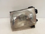 2000-01 Nissan Xterra Drivers Left Headlight. Fixed Price $29.40.