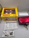 New Old Stock Bosch Red Fog Light # 0313106003-730 Includes Hardware. Fixed Price $110.99.